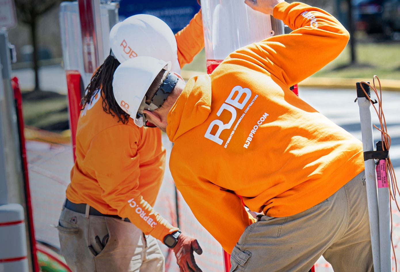 RJB employees installing a Tesla supercharger